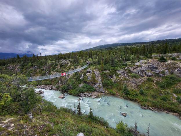 A bridge over a river
AI-generated content may be incorrect.