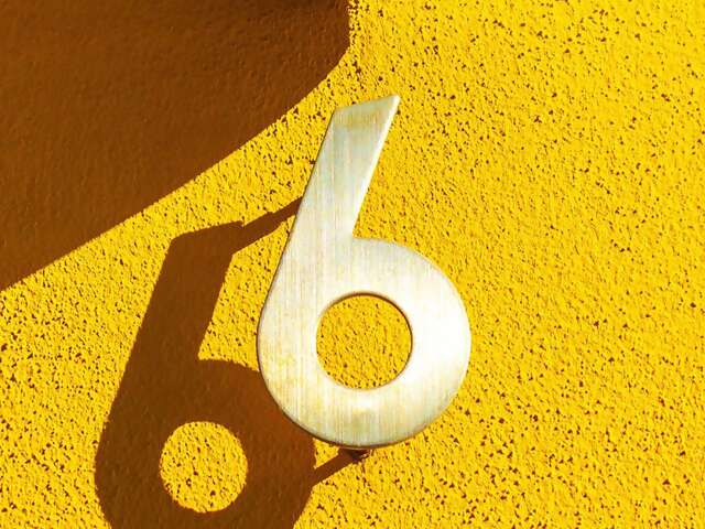 The glass hut behind door #6 of our most festive 12 homes for the holidays lets you bask under the Northern Lights or gaze out ov