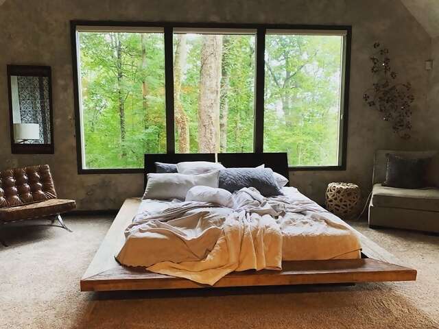 Only 10 minutes from downtown Asheville, Superhost Kimberly’s roomy retreat feels much more remote—just ask the recent guest who