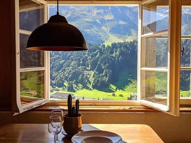 Wake to the sound of cowbells at this classic chalet high above town