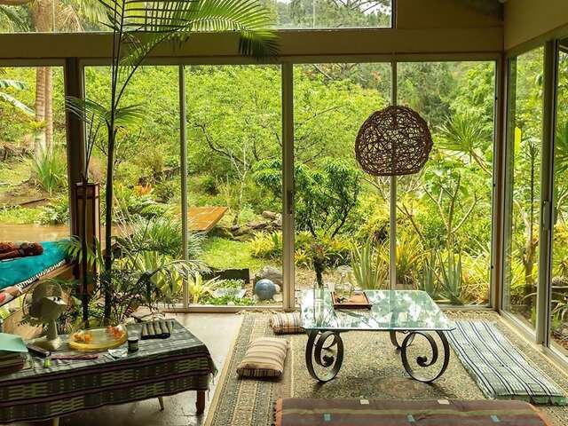 Once you’ve caught your breath at this house in the rainforest, you might find yourself ditching the itinerary to meditate by the